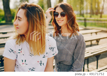 two girls in a summer park 49171752