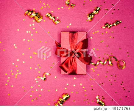 Gift box and Golden decorations and sparkles  49171763