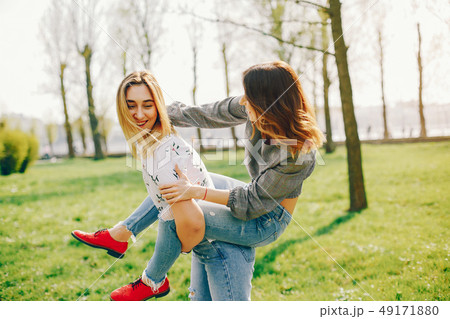 two girls in a summer park 49171880