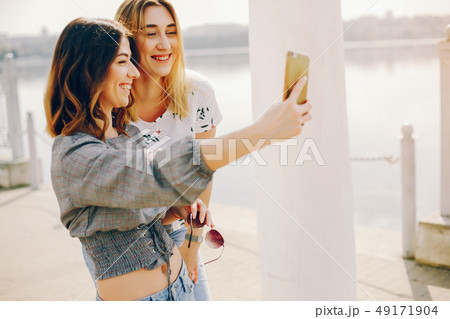 two girls in a summer park 49171904