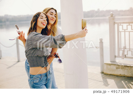 two girls in a summer park 49171906