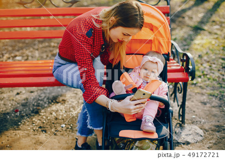 stylish mother with little daughter stylish mother with little daughter 49172721