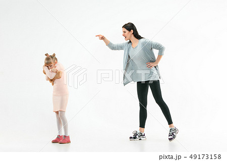 Angry mother scolding her daughter at home 49173158