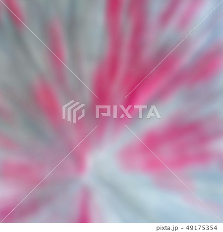 Abstract blurry image of red splash on a grey background 49175354