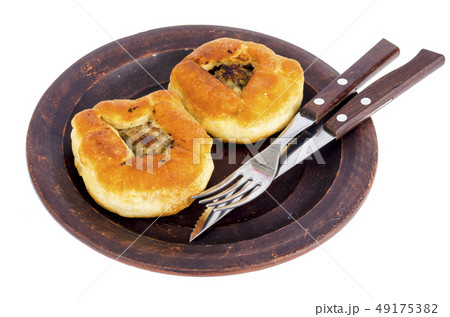 Fried yeast dough pie with meat. Fried yeast dough pie with meat. 49175382