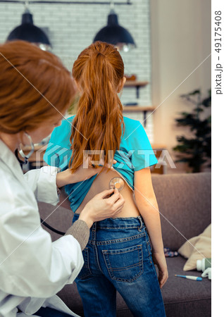 Nice pleasant girl having her health checked 49175408