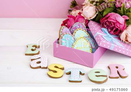 Colorful easter egg in gift box, cookies biscuits Colorful easter egg in gift box, cookies biscuits 49175860