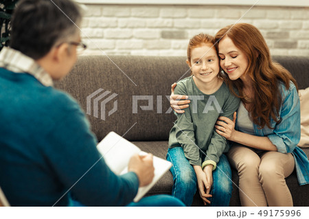 Delighted nice woman expressing her positive emotions 49175996