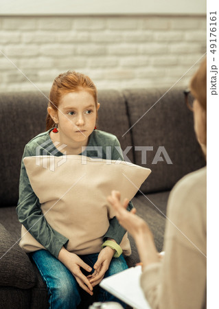 Nice red haired girl having a psychological session Nice red haired girl having a psychological session 49176161