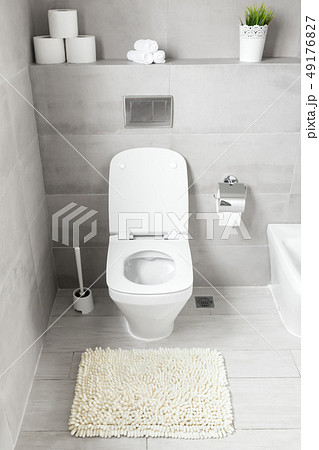 White ceramic bidet and toilet at luxury bathroom 49176827