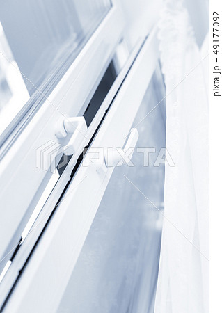 Double glazed window. Closeup on handle Double glazed window. Closeup on handle 49177092