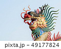 Golden dragon statue. 49177824
