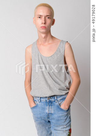 Portrait of young handsome androgynous man looking at camera 49179028