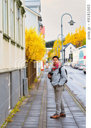 A man traveler sight seeing downtown Akureyri A man traveler sight seeing downtown Akureyri 49181005