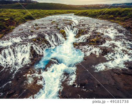 Bruarfoss waterfall in Brekkuskogur, Iceland. Bruarfoss waterfall in Brekkuskogur, Iceland. 49181738