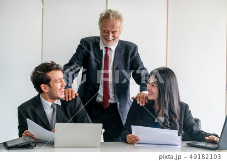 Business people, manager and employee in meeting. 49182103