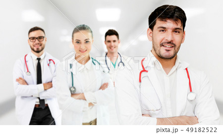 Doctor working in hospital with other doctors. Doctor working in hospital with other doctors. 49182522