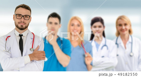 Doctor working in hospital with other doctors. 49182550