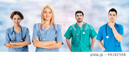 Doctor working in hospital with other doctors. Doctor working in hospital with other doctors. 49182568