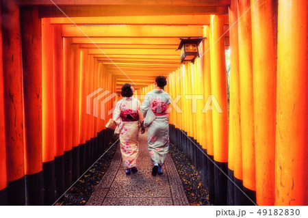 Traveler in Fushimi Inari Shrine, Kyoto, Japan Traveler in Fushimi Inari Shrine, Kyoto, Japan 49182830