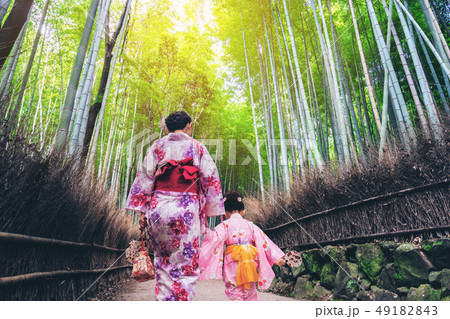 Traveler in Bamboo Forest Grove, Kyoto, Japan 49182843