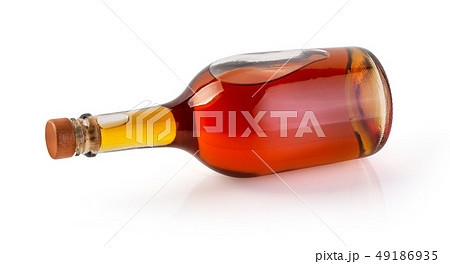 Full whiskey bottle isolated on white background Full whiskey bottle isolated on white background 49186935