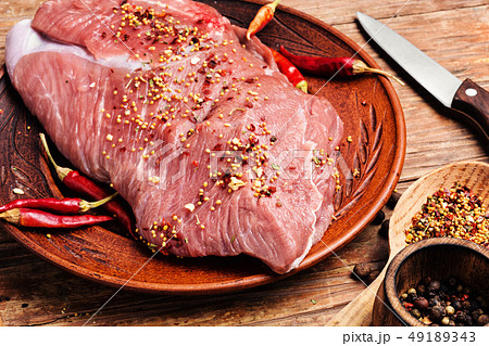 Raw meat with spices 49189343