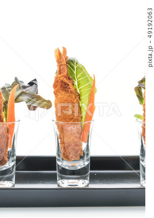 batter-fried prawns on white 49192063