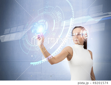 Woman touching the virtual future interface Woman touching the virtual future interface 49201574
