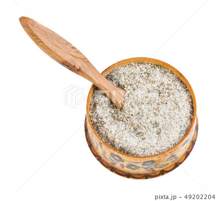 wooden salt cellar with spoon with seasoned salt 49202204
