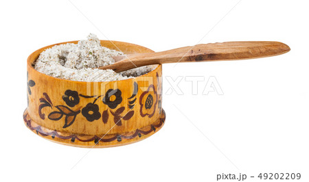 wooden salt cellar with spoon with seasoned salt 49202209