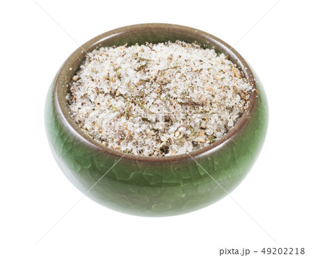 ceramic salt cellar with seasoned salt with spices 49202218