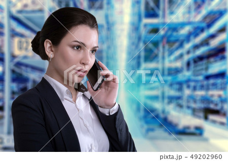 Portrait of pretty businesswoman talking on the phone Portrait of pretty businesswoman talking on the phone 49202960