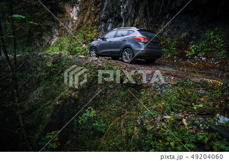 Off-road travel on car on mountain road, Caucasus Off-road travel on car on mountain road, Caucasus 49204060