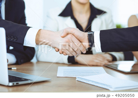 Business people shaking hands at meeting or negotiation in the office. Handshake concept. Partners 49205050