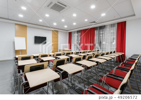 Empty modern conference hall in new hotel. Room for training, education, group classes, exams Empty modern conference hall in new hotel. Room for training, education, group classes, exams 49206572