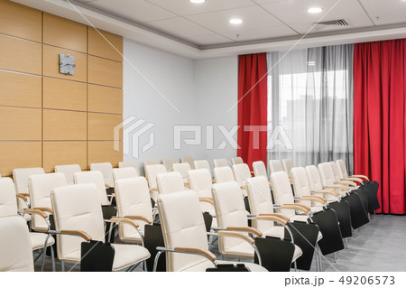 Empty modern conference hall in new hotel. Room for training, education, group classes, exams Empty modern conference hall in new hotel. Room for training, education, group classes, exams 49206573