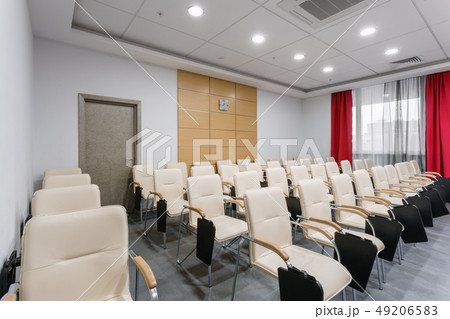 Empty modern conference hall in new hotel. Room for training, education, group classes, exams Empty modern conference hall in new hotel. Room for training, education, group classes, exams 49206583