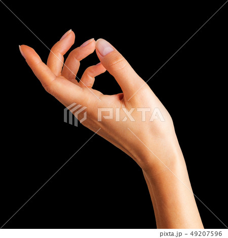 Woman hand holding something with two fingers 49207596
