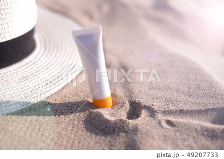 woman sunscreen beach summer sun protection. woman sunscreen beach summer sun protection. 49207733