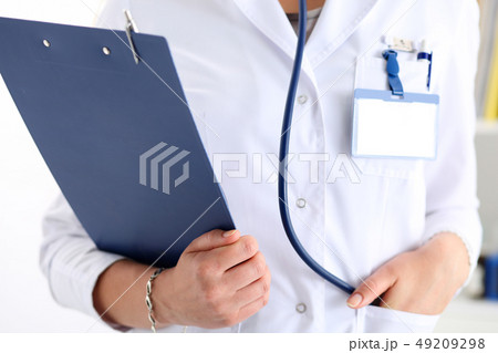 Female doctor hand hold document pad Female doctor hand hold document pad 49209298