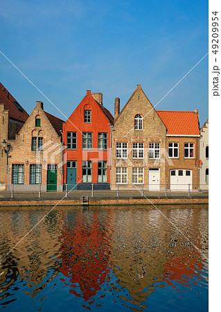 Canal and old houses. Bruges (Brugge), Belgium Canal and old houses. Bruges (Brugge), Belgium 49209954