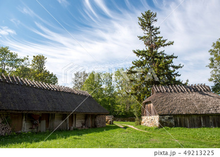 Old barns with thatched roof in Estonia 49213225