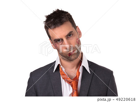 Close up of a businessman with bloody lip, beaten 49220618