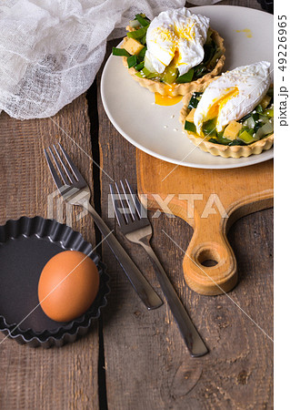 tartlets with leek and Perfect poached eggs  at th 49226965