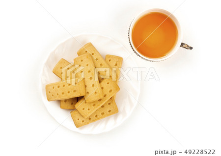 A closeup photo of Scottish shortbread butter cookies, shot from the top on a white background with 49228522