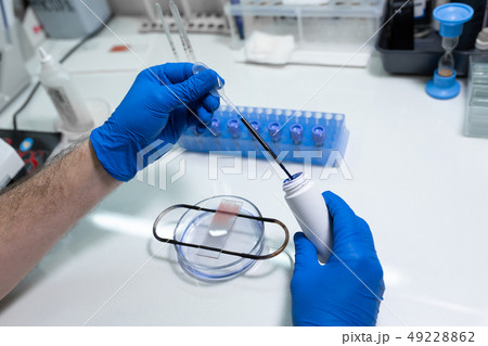 scientist prepare blood sample for research on 49228862