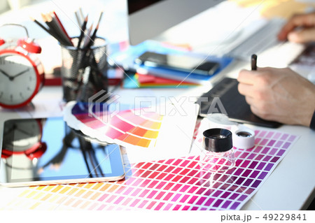 Test print paper page with colour test design fantail and magnifying glass 49229841