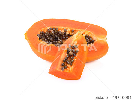 haft and portion cut ripe papaya with seeds on haft and portion cut ripe papaya with seeds on 49230084