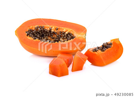 haft and portion cut ripe papaya with seeds on 49230085